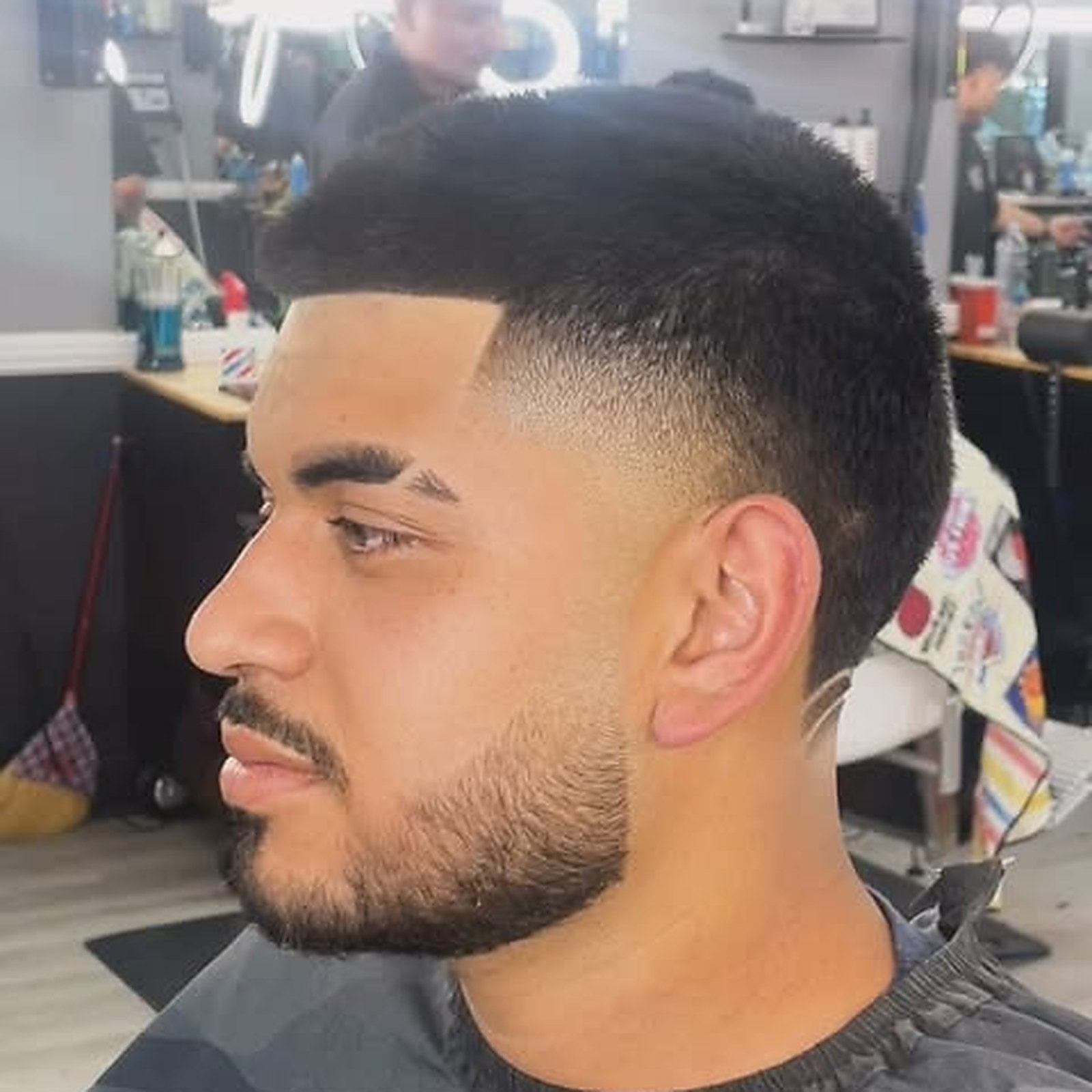 Fade and beard blend — Buzz faded down and blended into a full beard