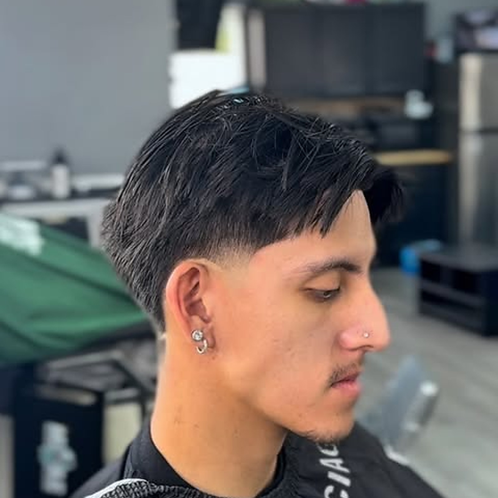 Textured fringe — Fringe left heavy, sides kept tight through the taper